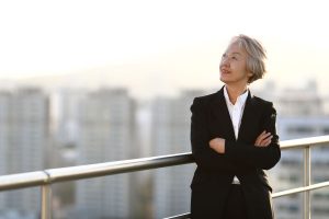 Woman happily gazing into the sky